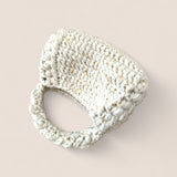 Bolso Bombón Blanco FW25/26 The Labbo — bolso artesanal con destellos dorados.