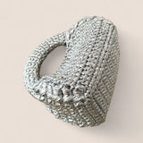 Mini bolso sostenible de lujo Bombón Plata con acabado metálico sofisticado.