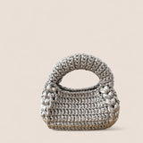 Bolso Bombón Plata FW25/26 The Labbo — bolso artesanal en tejido plateado brillante.