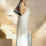 Bolso rayado al hombro