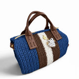 Bolso Bowling Urbana Azul Denim con franjas marrón y blanco y ranita esmaltada, vista tres cuartos