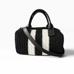 Vista trasera del bolso Bowling Urbana Negro y Blanco con bandolera de ecocuero negro