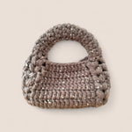 Bolso Bombón Piedra FW25/26 The Labbo — bolso artesanal sostenible en tonos piedra y plata.