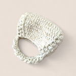 Bolso Bombón Blanco FW25/26 The Labbo — bolso artesanal con destellos dorados.