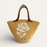 Mini Capazo Lola de rafia artesanal con bordado floral blanco