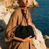 Bolso Copenhague negro con correa para colgar