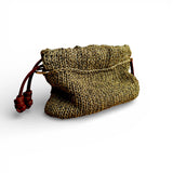 Detalle del tejido a mano del bolso Copenhagen Dorado en hilo reciclado