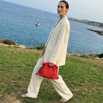 Bolso de crochet rojo con estructura Copenhague tejido manual