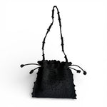 Vista frontal del bolso Copenhague Lace negro colección SS2026