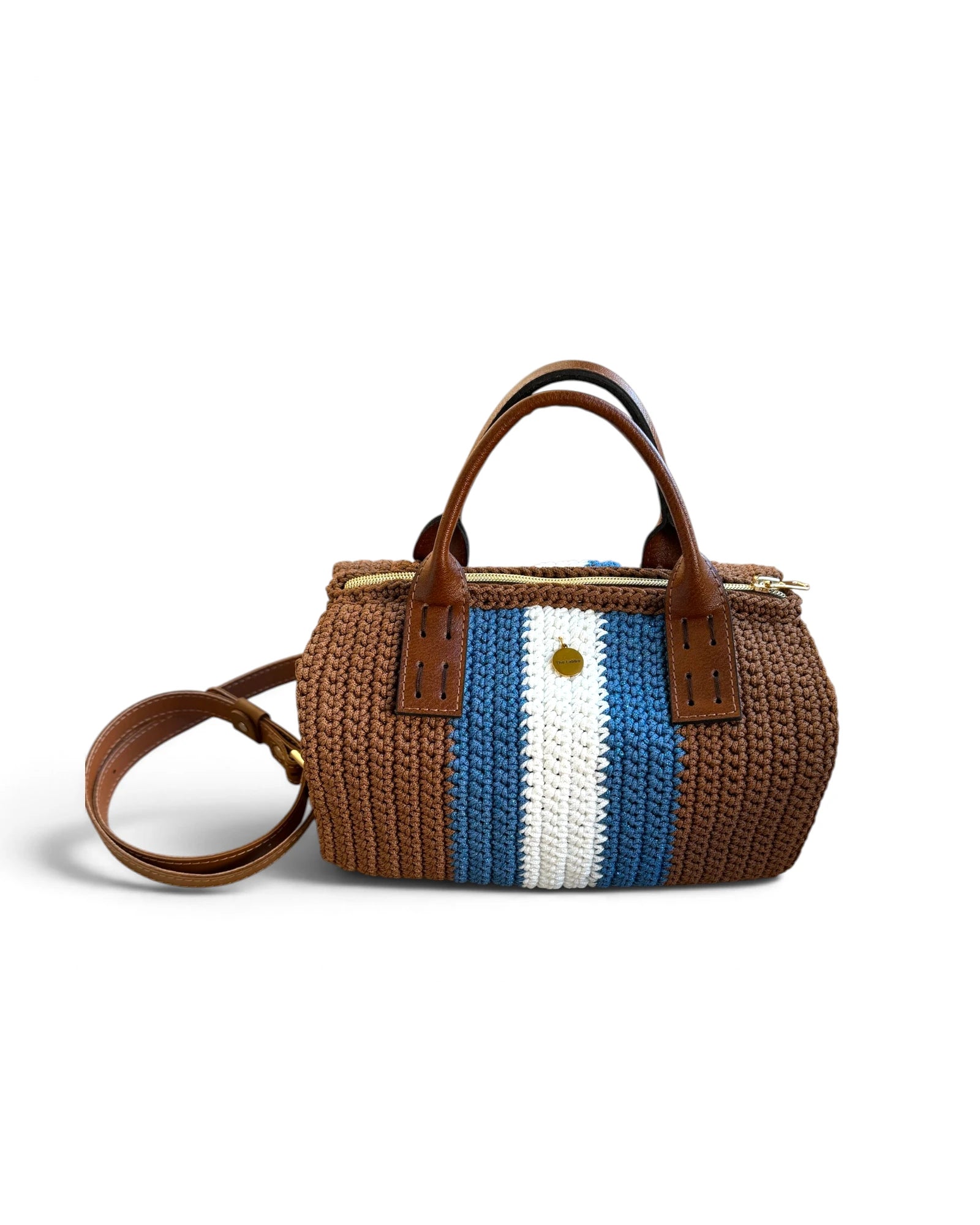 Bolso Bowling Urbana marrón con franjas azul y crudo, asas y bandolera de ecocuero