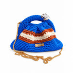 Clutch Urbana Blue by The Labbo in vivid blue, terracotta brown and ecru, with a gold-plated brass chain against a white background.